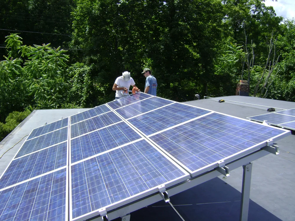 A residential rooftop fully covered with photovoltaic solar panels